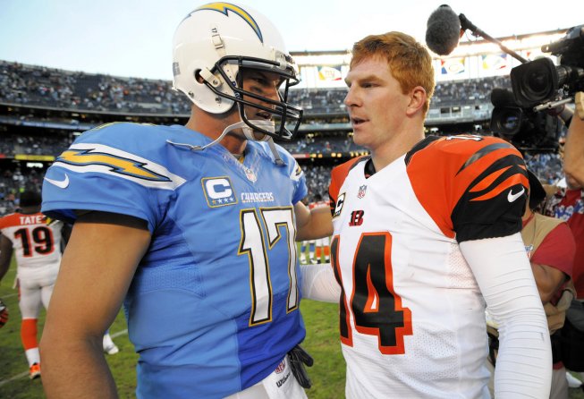 Philip Rivers shaking hands with Andy Dalton after a game.