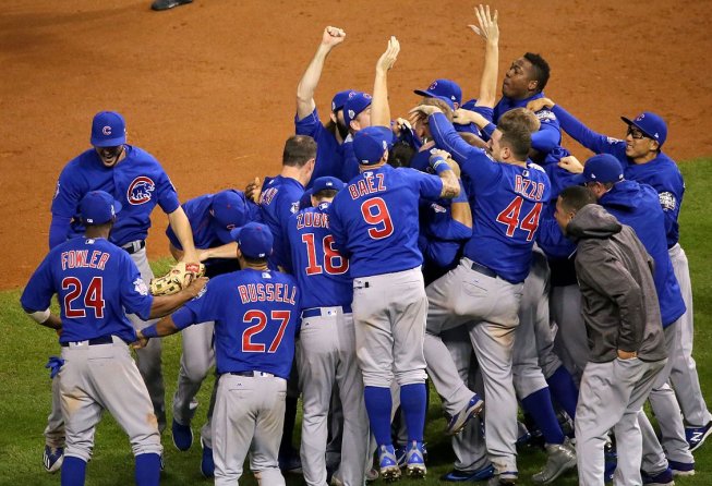 Chicago Cubs celebrating on the mound.