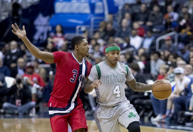 Isaiah Thomas dribbling up court