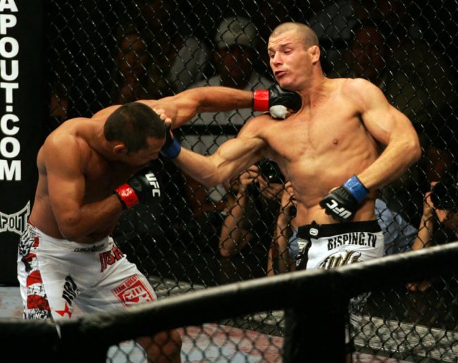 11 July 2009: Dan Henderson on left and Michael Bisping of Britain exchange punches during their middleweight fight at the UFC 100 event at the Mandalay Bay Events Center in Las Vegas, NV.