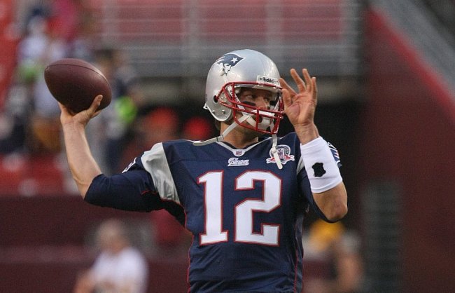 Tom Brady throwing a pass