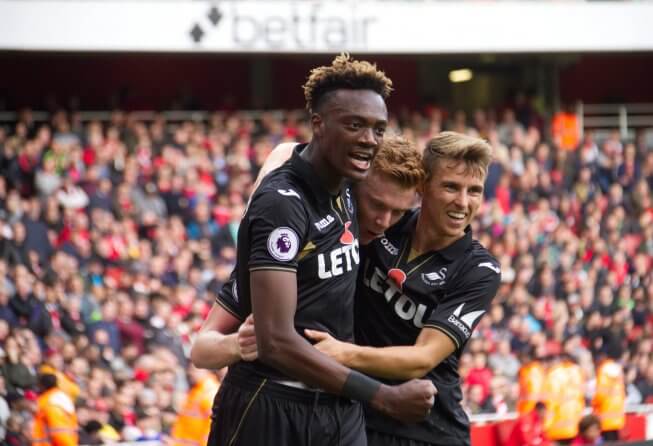 Swansea celebrates a goal.