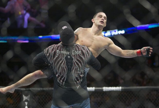 Frankie Edgar celebrating with his cornerman