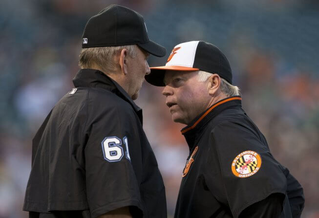 Orioles manager Buck Showalter talking to umpire Bob Davidson