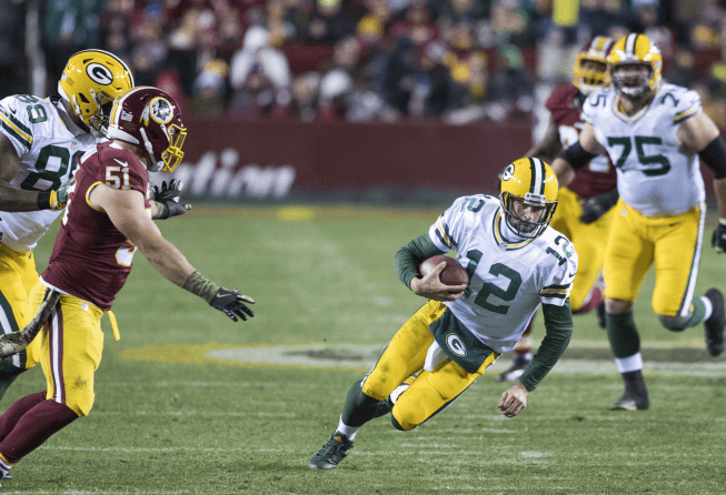 Green Bay QB Aaron Rodgers sliding.