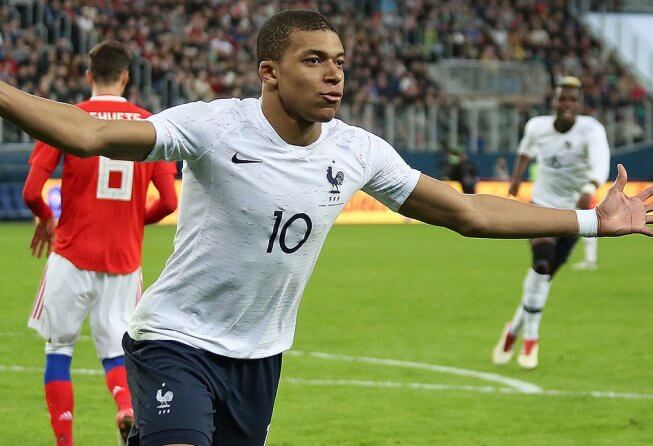Kylian Mbappe celebrating his second goal for France.