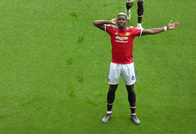 Paul Pogba celebrates a goal with Manchester United.