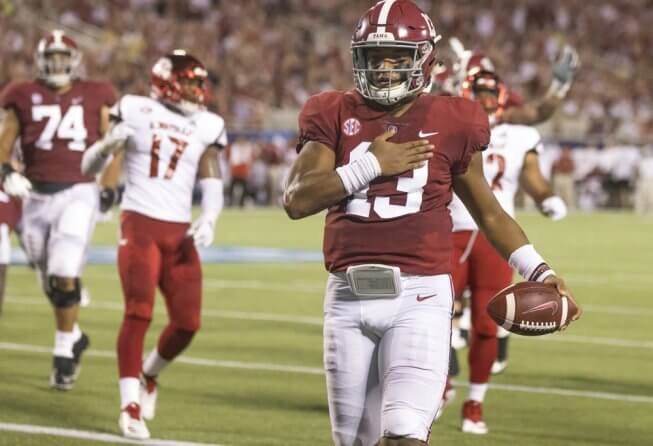 Alabama's Tua Tagovailoa scoring a rushing touchdown