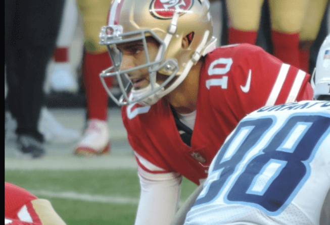 Jimmy Garoppolo taking a snap