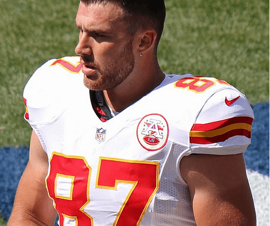 Travis Kelce on the field with Kansas City