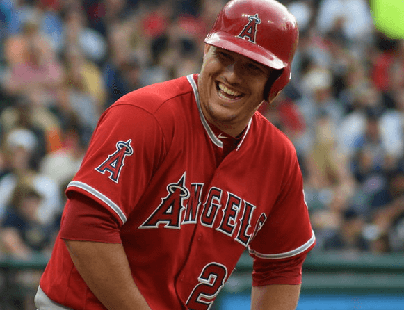 Mike Trout laughing at the plate