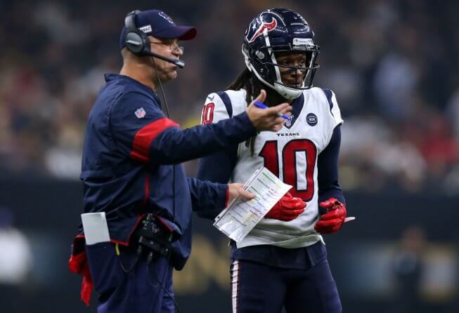 Bill O'Brien and Deshaun Watson talking on the Texans sideline.