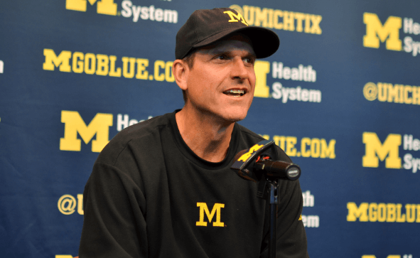MIchigan coach Jim Harbaugh at a press conference