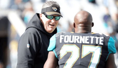 Leonard Fournette talking to Doug Marrone on the sideline