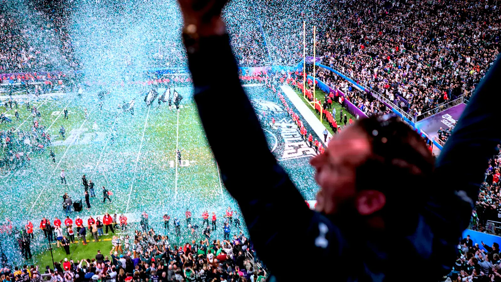NFL fan celebrates a point for his team in the Eagles Stadium