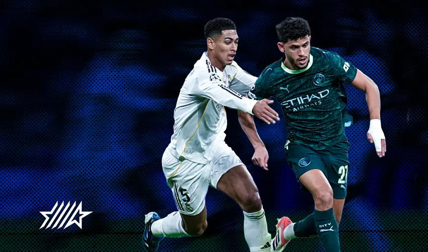 Acción de juego entre 2 jugadores del real madrid y el manchester city en la champions league