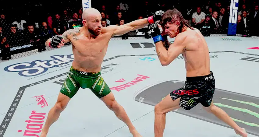 UFC fighters exchange punches during MMA fight